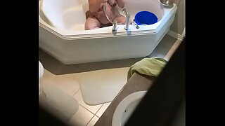 spying on my step mom while bathing