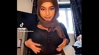 Barely legal teen shows off her tits